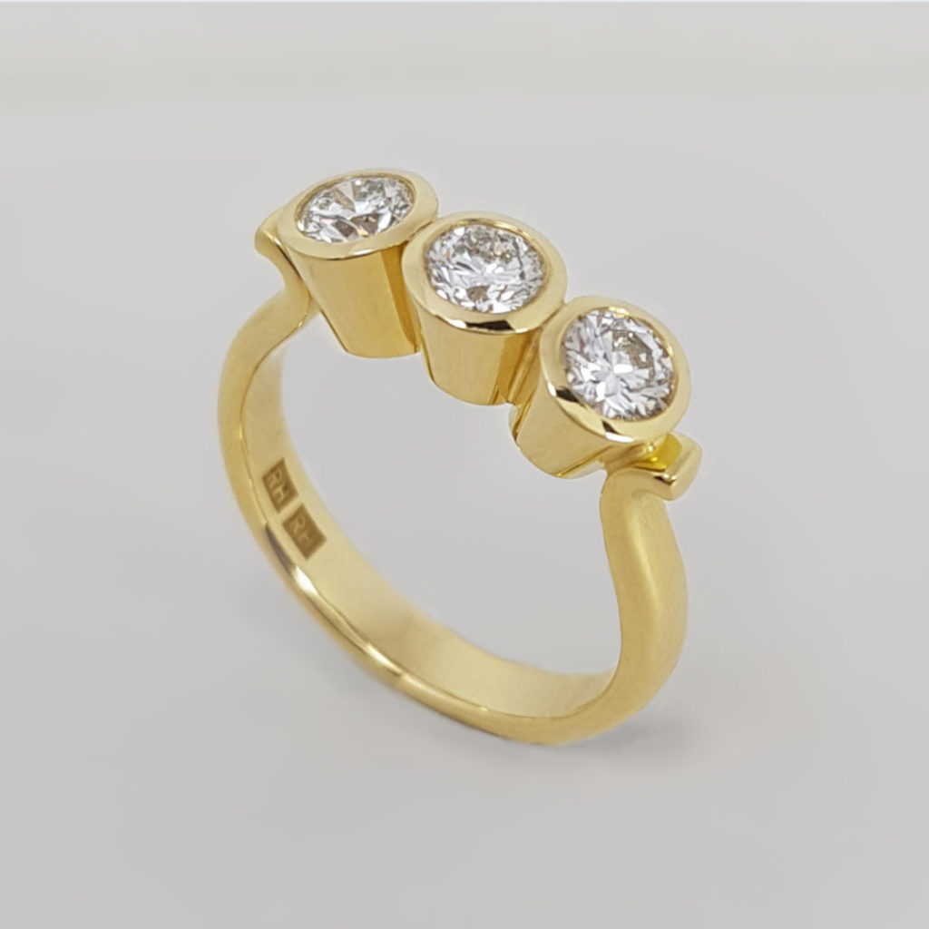 Rudolf Heltzel Bezel Set Three Diamond Engagement Ring Main